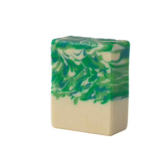 Green and white swirled soap bar on a white background
