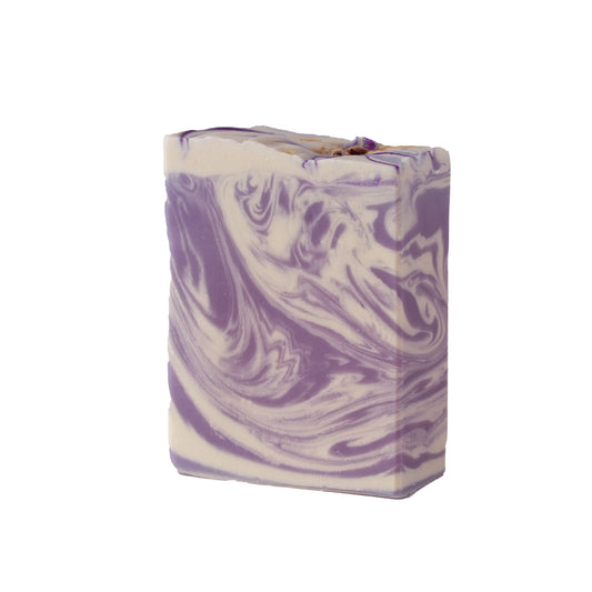 Swirled lavender purple and white soap bar on a white background