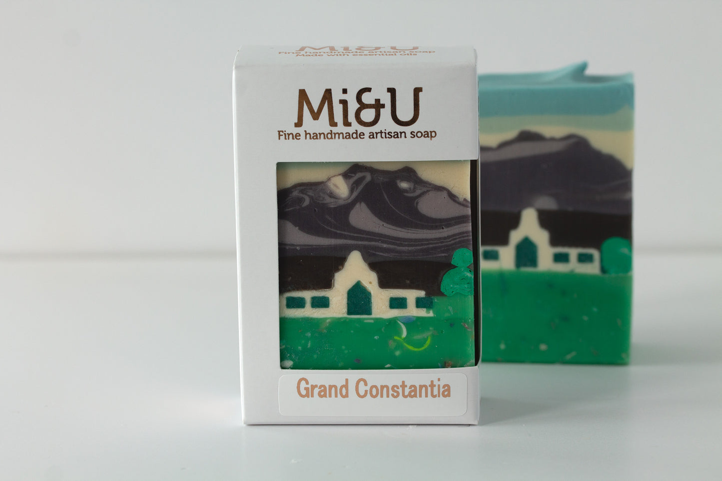 Mi&U handmade artisan soap with packaging on a white background