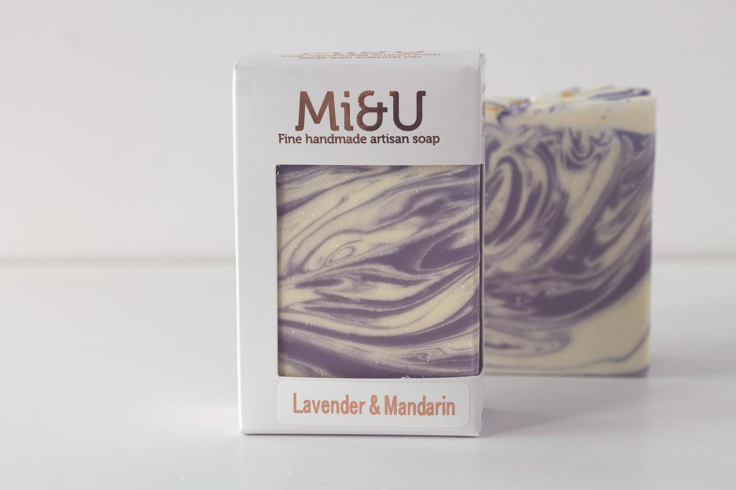 Mi&U lavender and mandarin soap with packaging on a white background