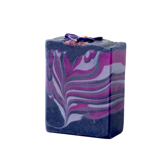 Marbled purple and white soap bar on a white background