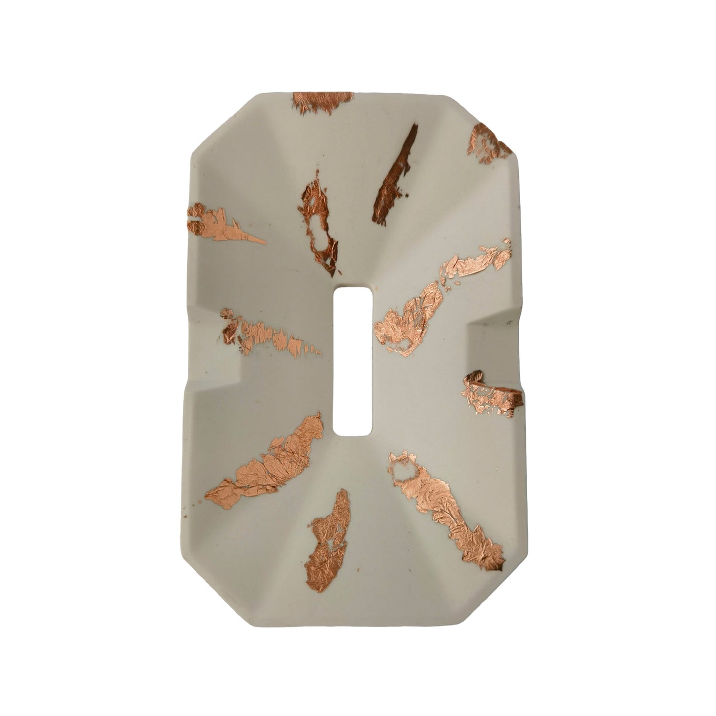 Decorative soap dish with a geometric shape on a white background