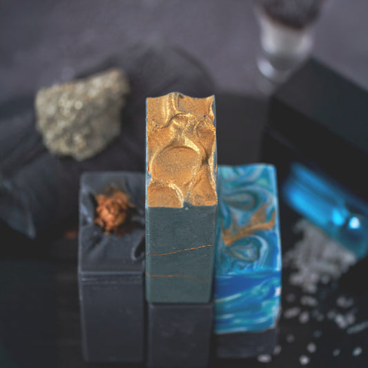 Close-up of three artisan soap bars with gold texture and ocean swirls — part of The Well Kept Man Father's Day gift set by Mi&U Soap