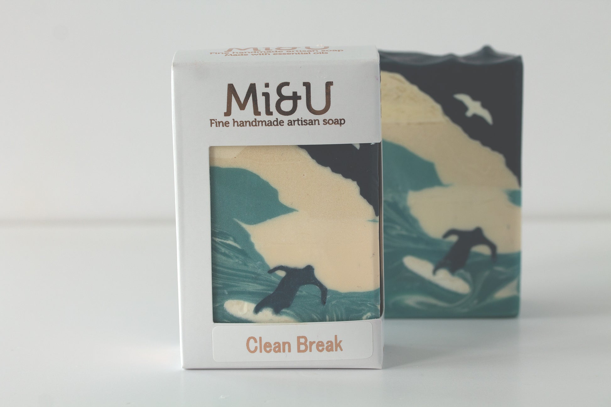 Mi&U handmade artisan soap in a carton with a surf design on a white background